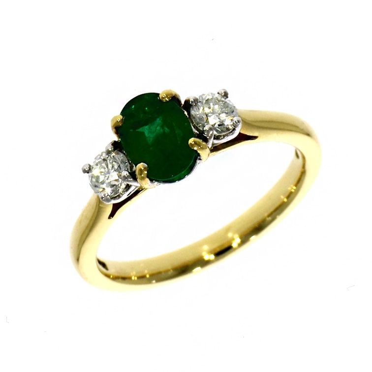 18ct Yellow Gold Oval Cut Emerald And Diamond Three Stone Ring