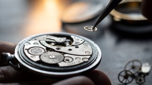 Close-up image of someone servicing a watch
